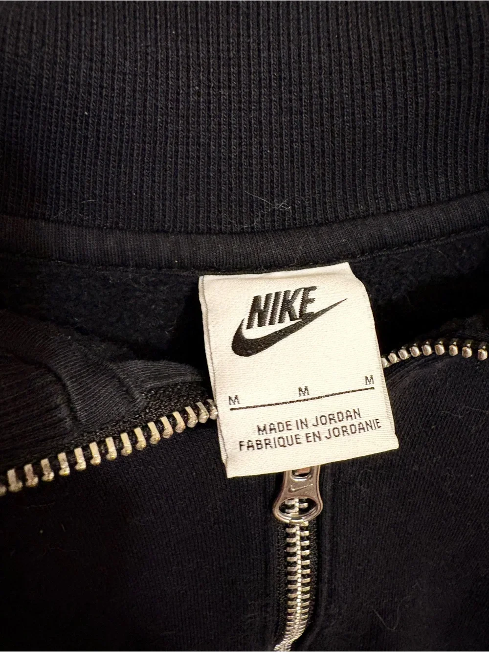 Nike Black Half-Zip Pullover with White Swoosh Logo